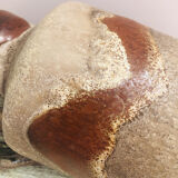 Ancient sided jug in flamed sandstone