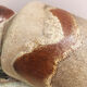 Ancient sided jug in flamed sandstone