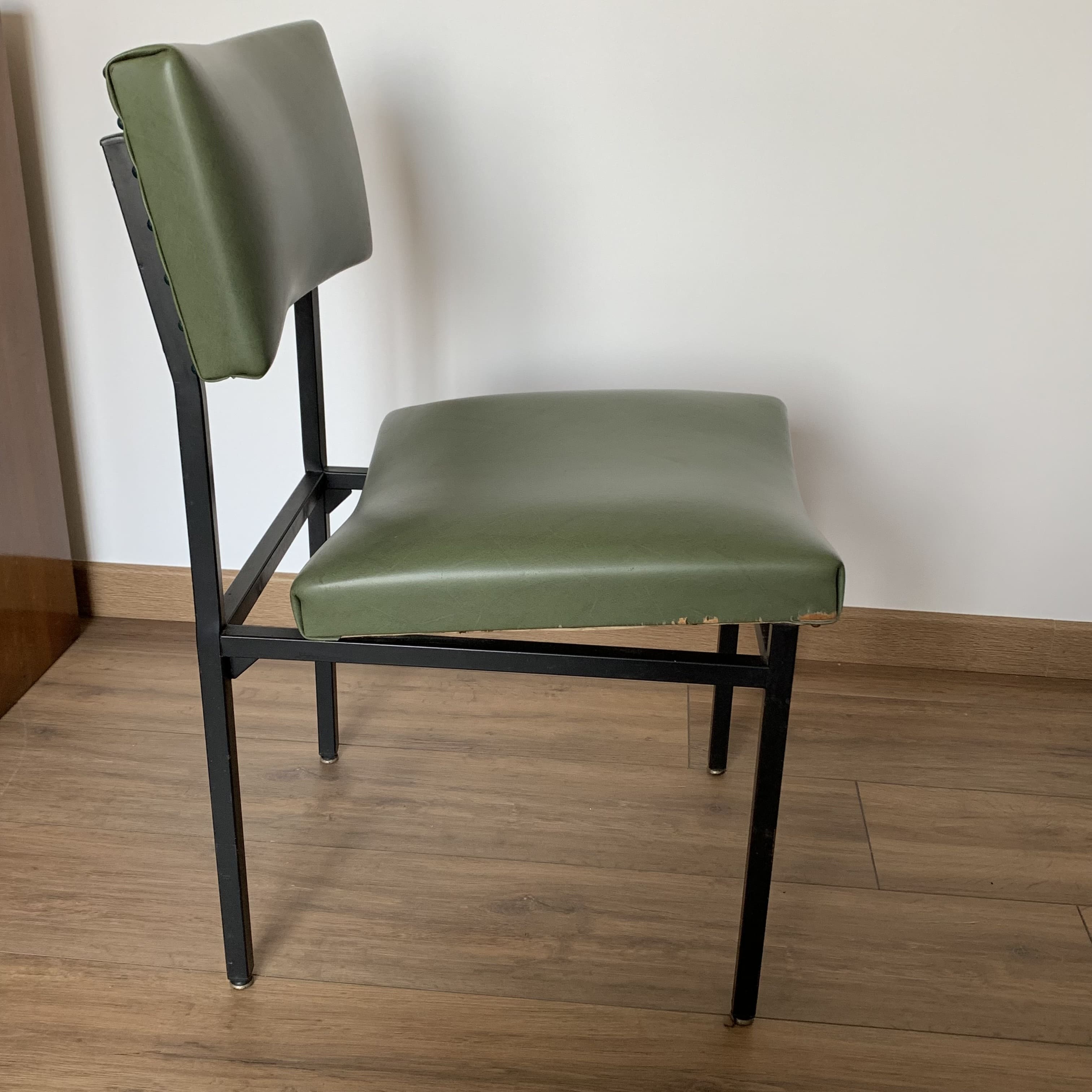 green and metal skai chair