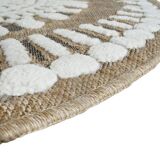 Round jute rug with white relief patterns, 90 cm
