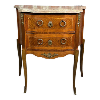 Louis XV/XVI transition style curved chest of drawers in marquetry and bronze