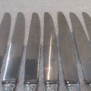 12 silver plated table knives by Argit goldsmith? Art Deco floral bands