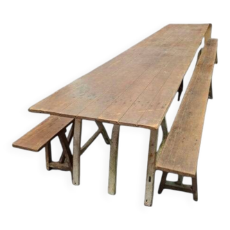 Very large farmhouse table and its benches.