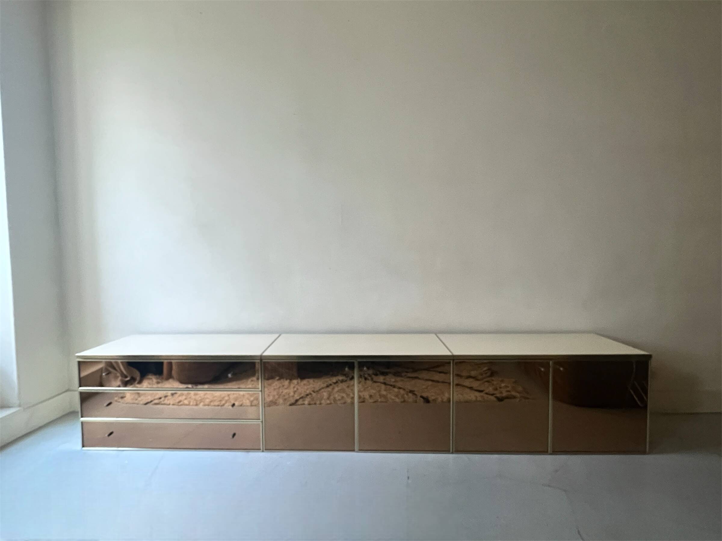 Ivory lacquered sideboard with polished finish and smoked mirror, JC Mahey design 1970.