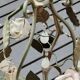 Italian cage chandelier decorated with ceramic roses and glass paste pendants