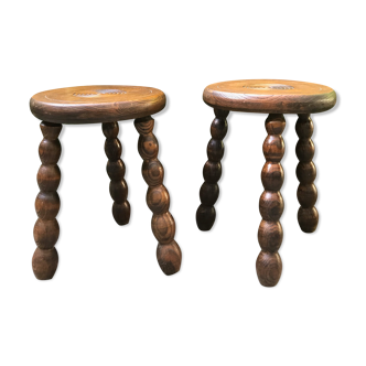 Pair of tripod stools made of turned wood