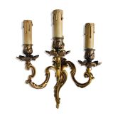 Wall light in gilded bronze