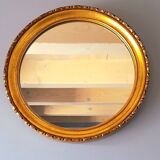 Round golden mirror