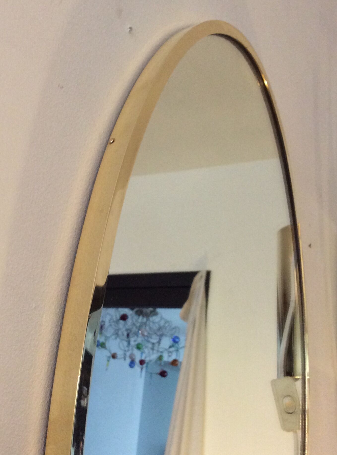 Belgo Chrom oval mirror from the 70s in solid brass