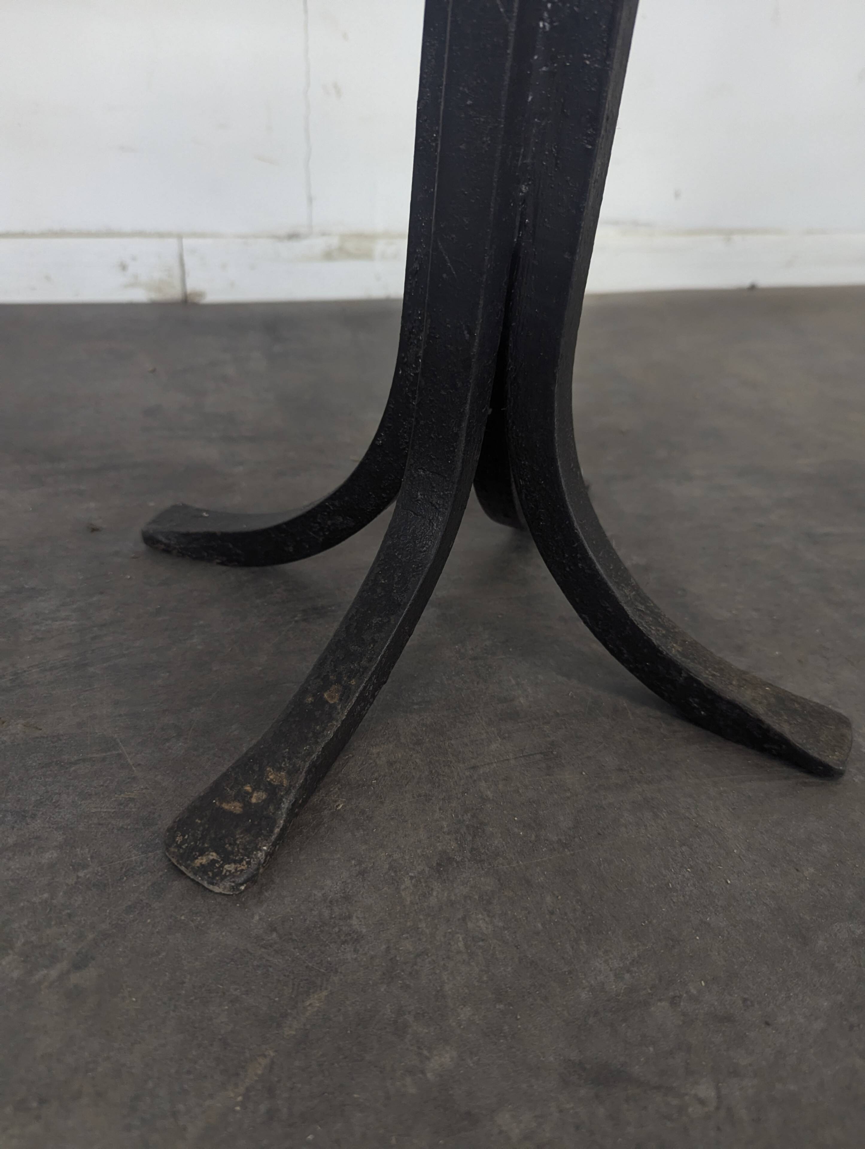 Wrought iron gueridon with a marble top circa 1950