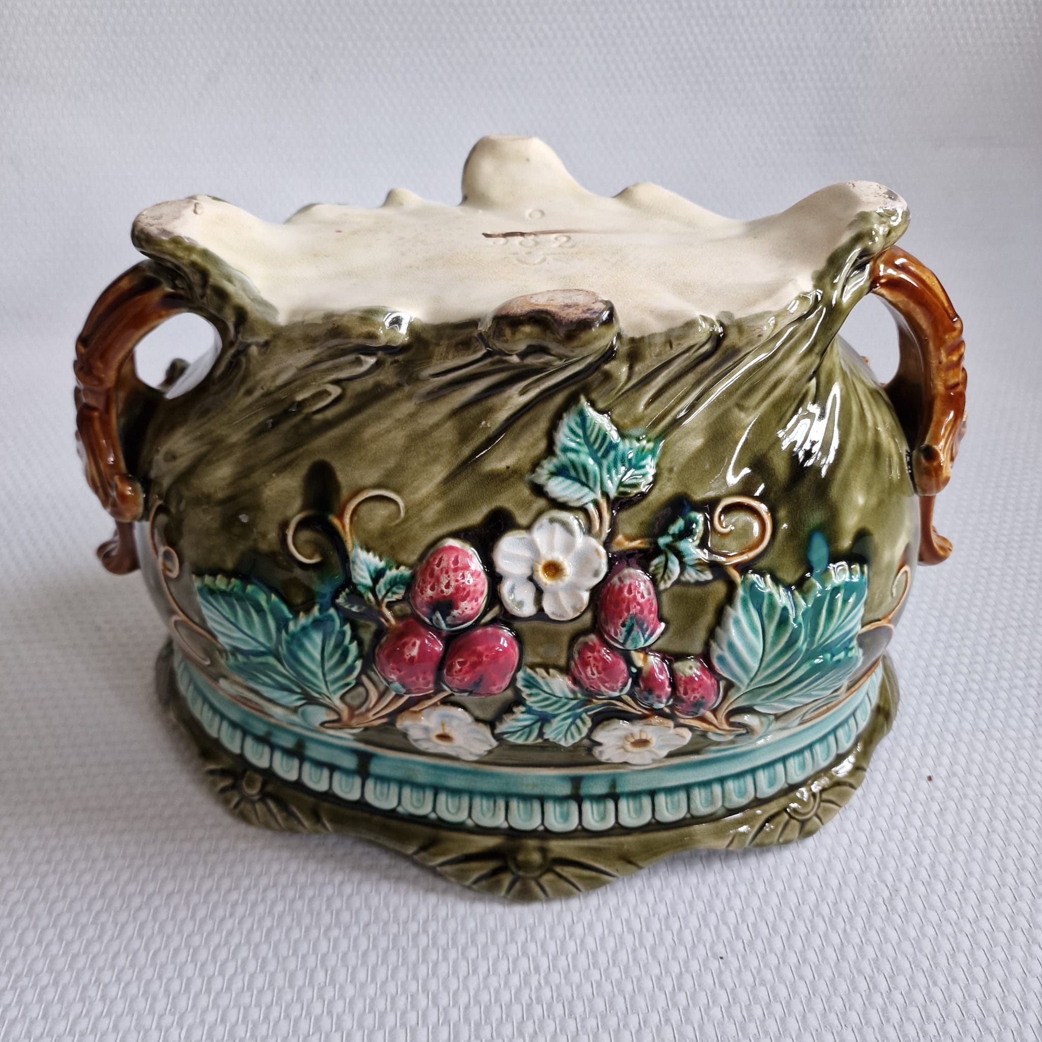 Onnaing planter in Majolica floral pattern with strawberry-shaped accents - France 1900