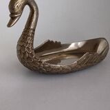 Metal swan emptier