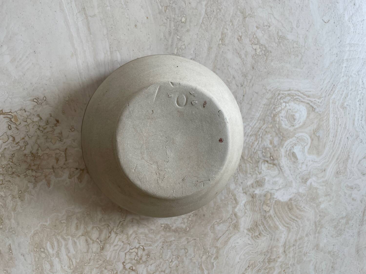 Old stoneware bowl with brown edge