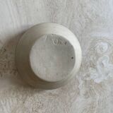 Old stoneware bowl with brown edge