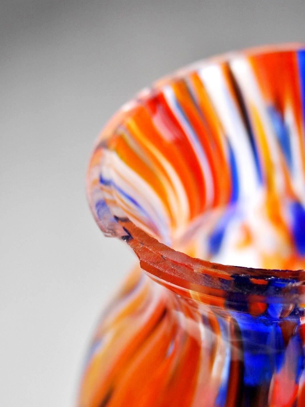 Small antique art deco cobalt orange speckled glass paste vase