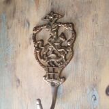 Old brass patère coat rack