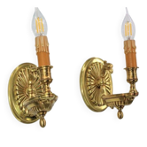 Pair of gilt bronze wall lights in the Directoire style by Lucien Gau.