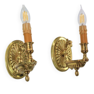 Pair of gilt bronze wall sconces in the Directoire style by Lucien Gau.