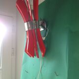 Sconce in red Bakelite and chrome