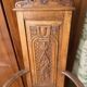 Pair of carved walnut armchairs in Renaissance style