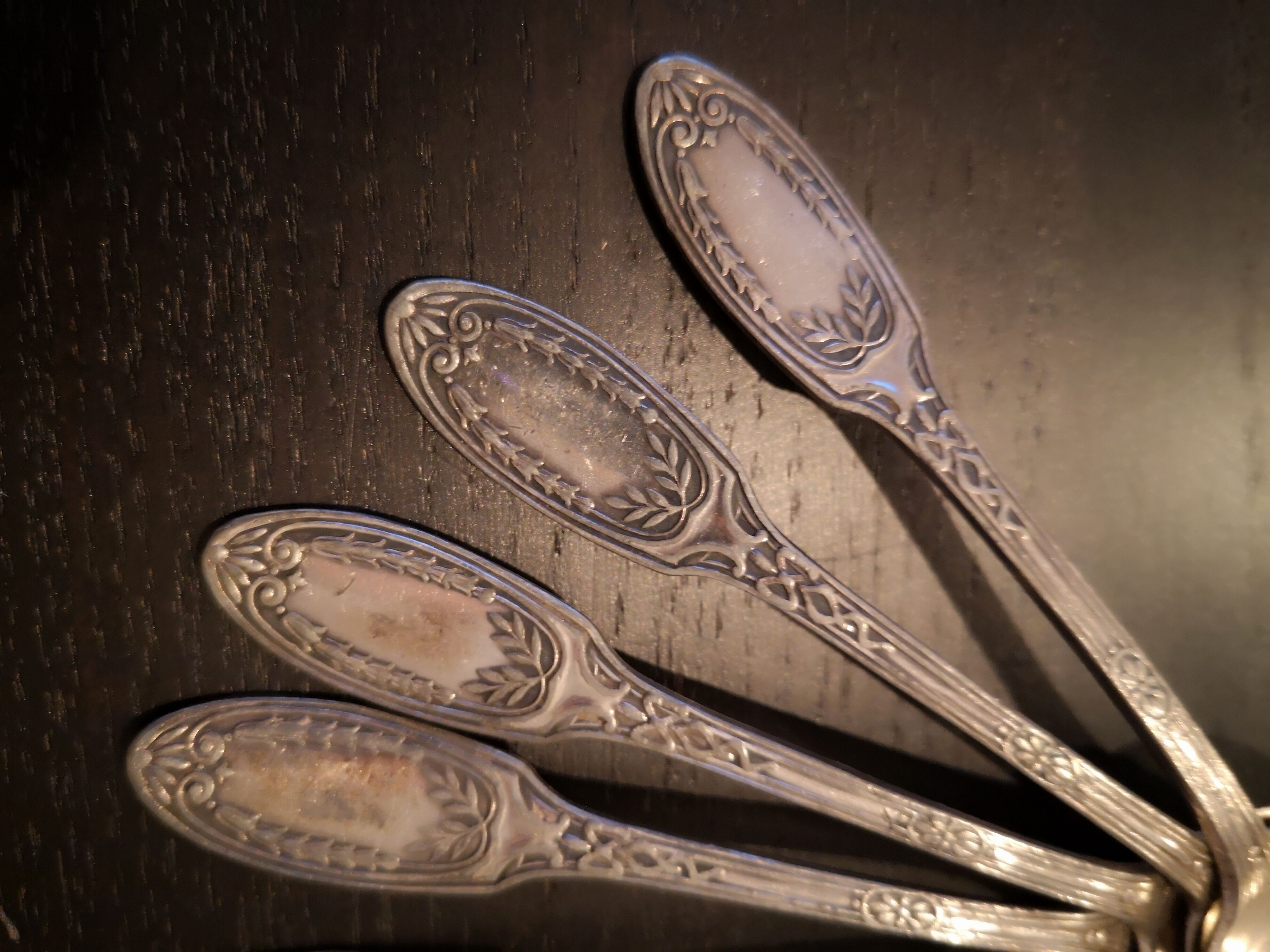 10 small silver metal spoons