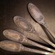 10 small silver metal spoons