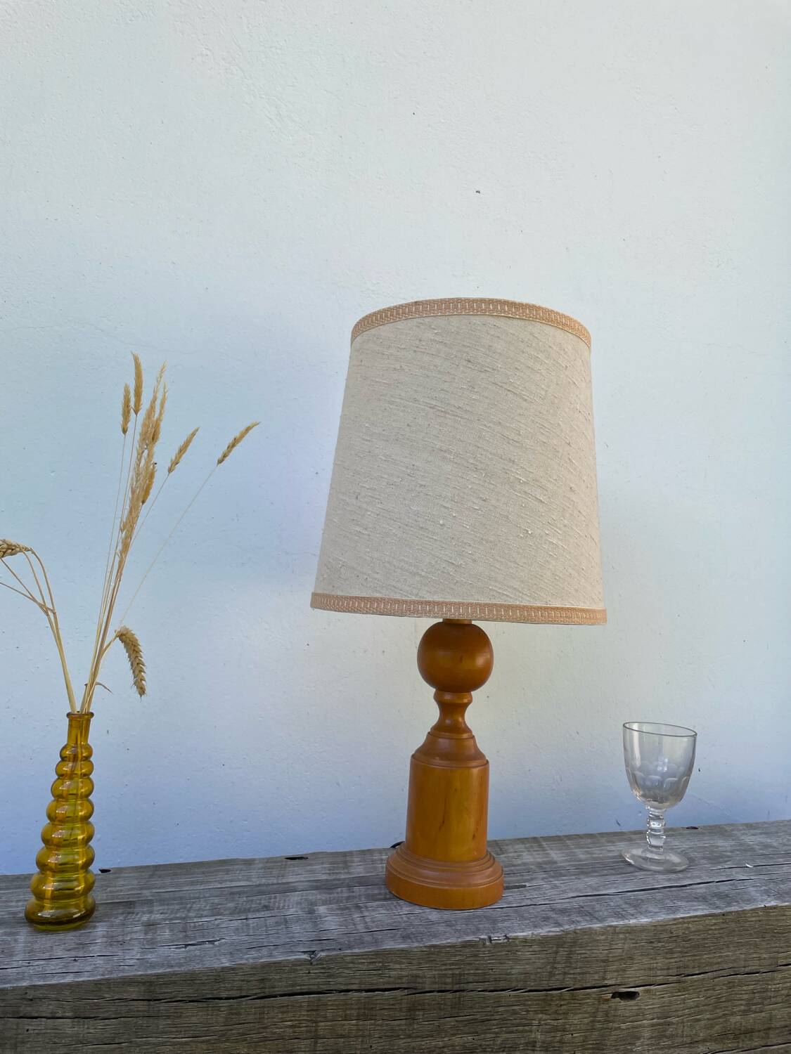Old turned wooden lamp