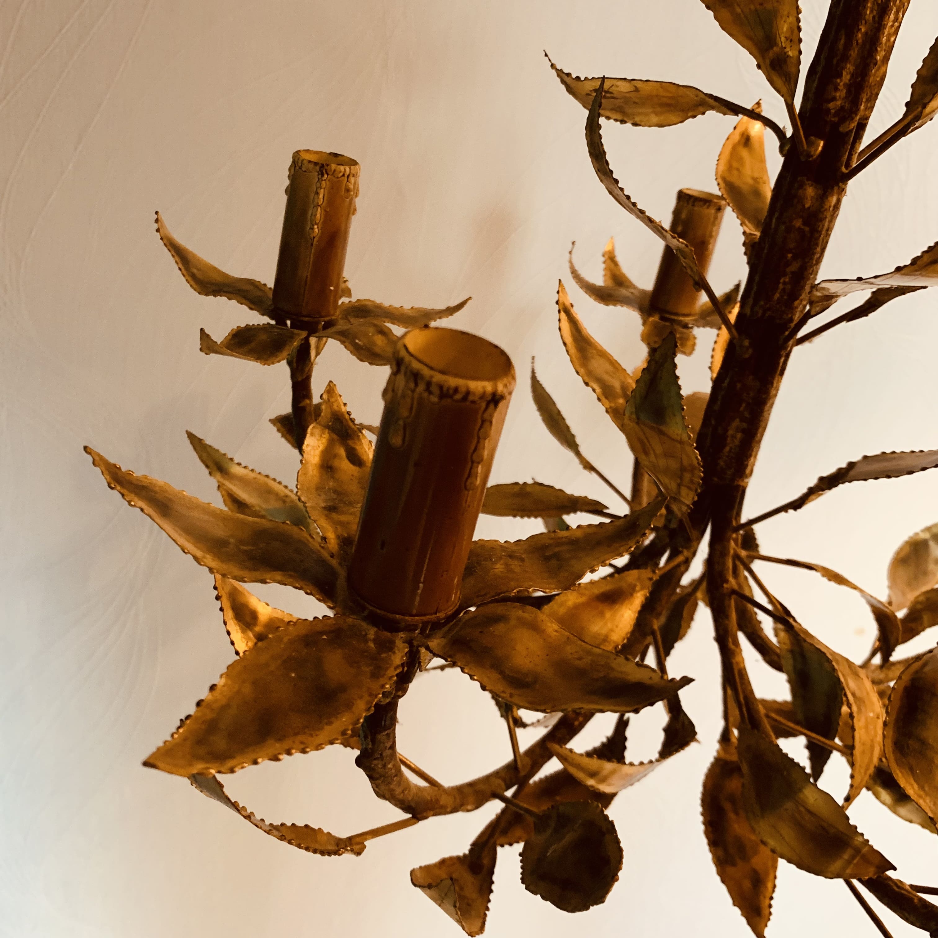 Vintage chandelier foliage decoration