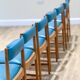 7 chaises de salle à manger McIntosh en vinyle bleu