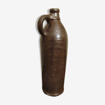 Old vintage bottle /carafe in brown sandstone with handle