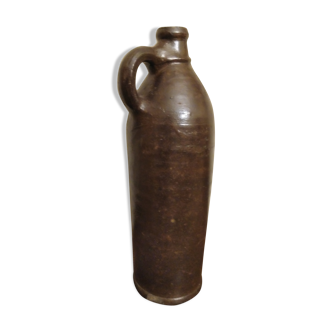 Old vintage bottle /carafe in brown sandstone with handle