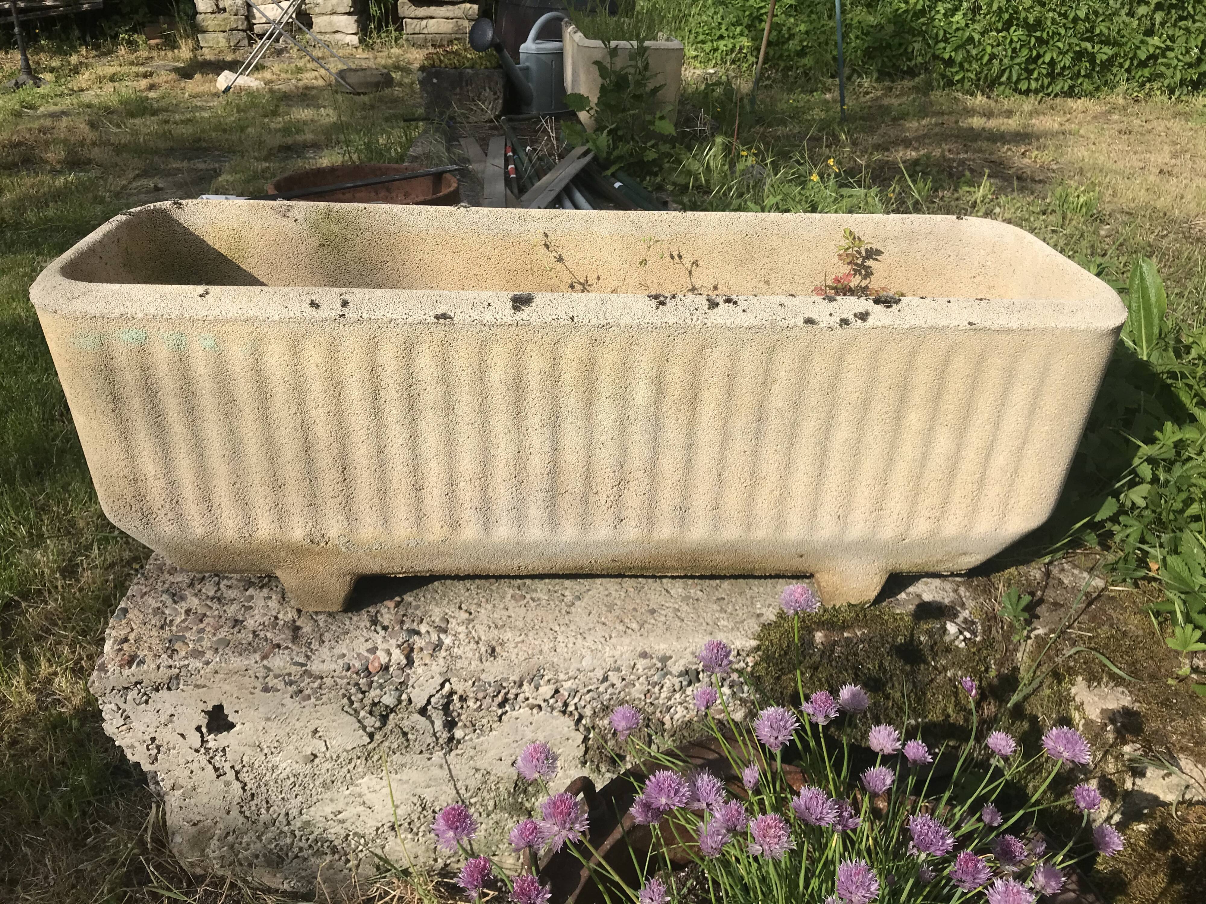 Reconstructed stone planters