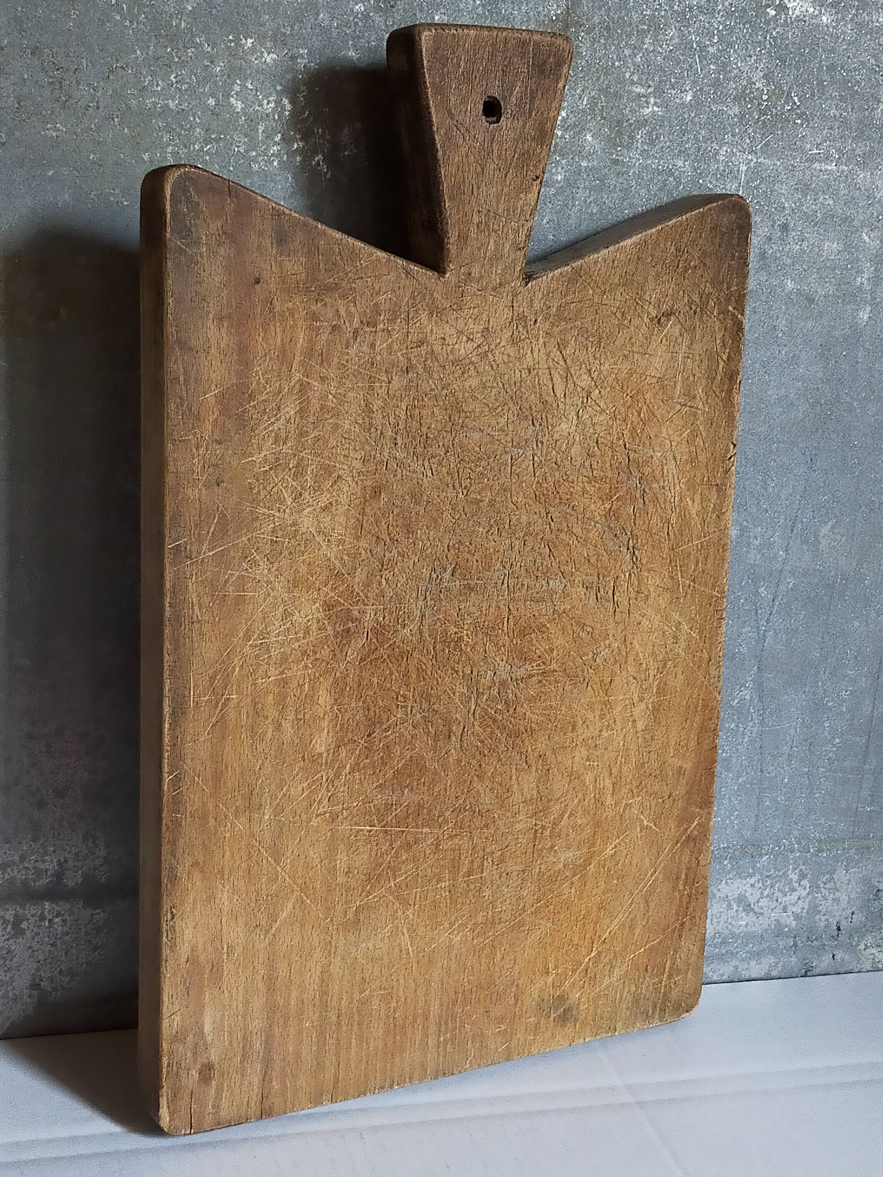 Cutting board in old solid wood