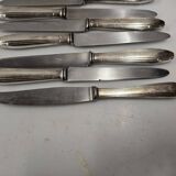 12 silver-plated knives from the mid-20th century
