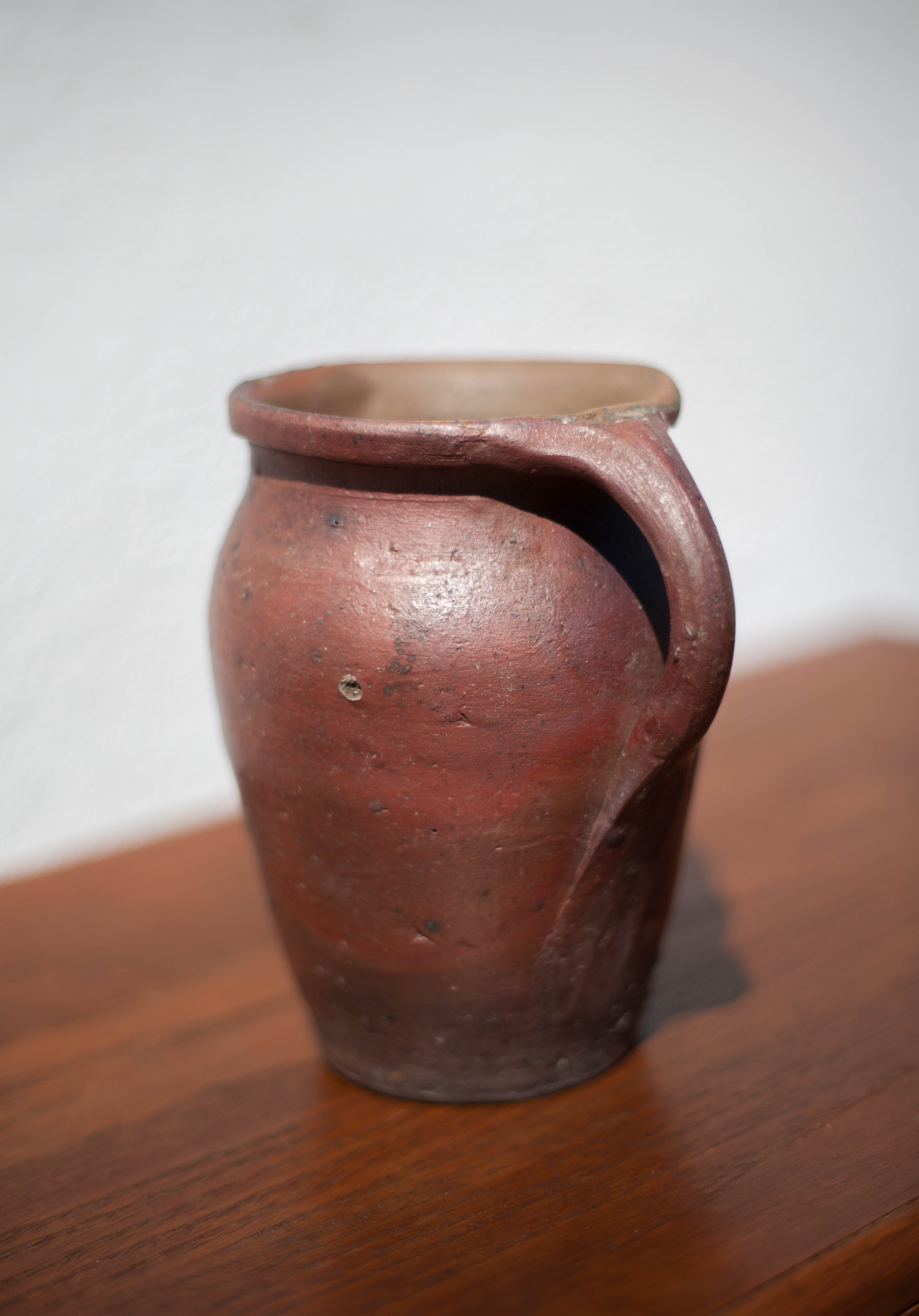 Pot in Norman sandstone of Ger