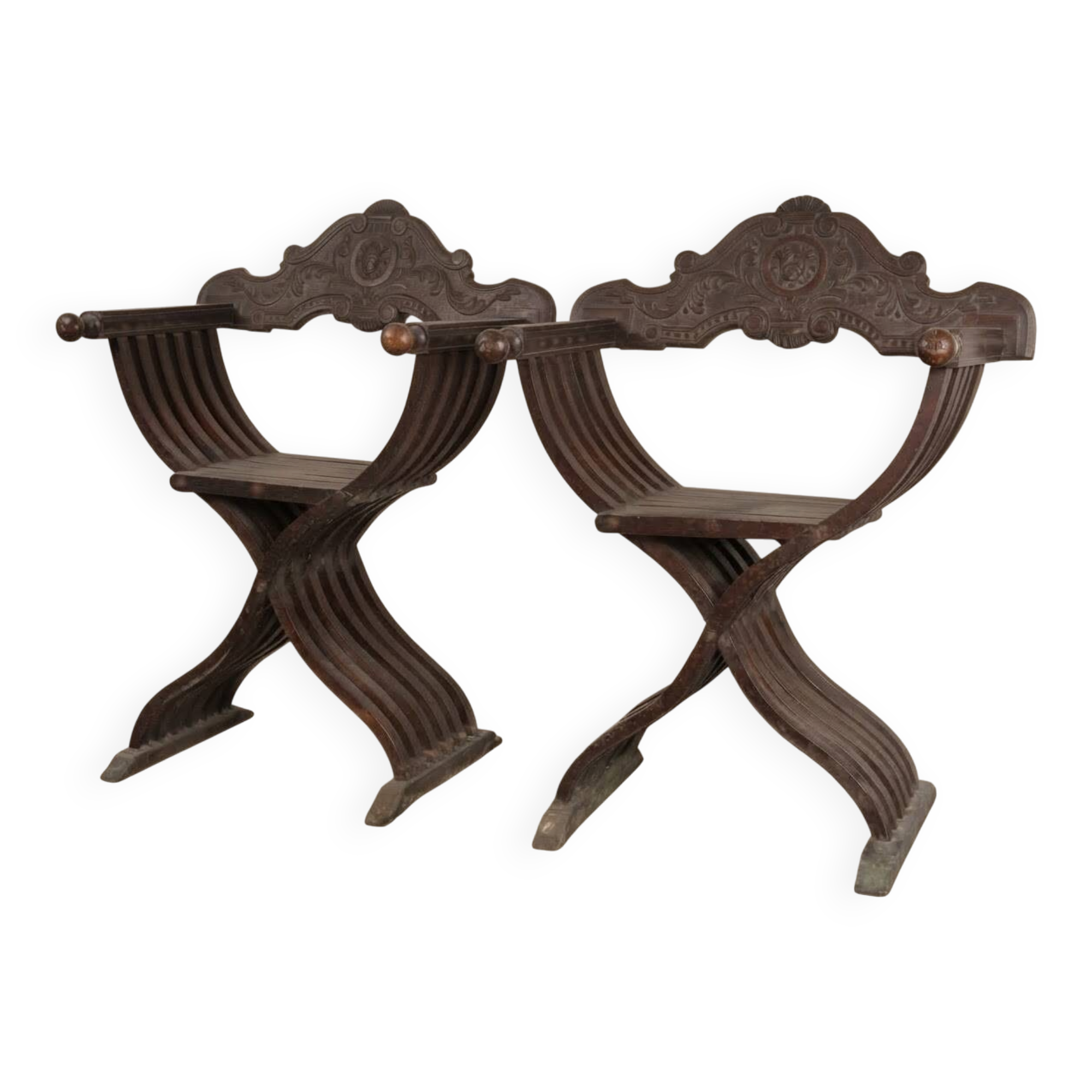 Pair of antique Savonarole armchairs in Renaissance style.