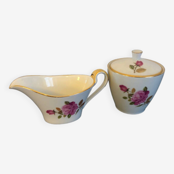Vintage porcelain sugar bowl and milk jug made in France