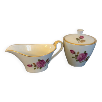 Vintage porcelain sugar bowl and milk jug made in France