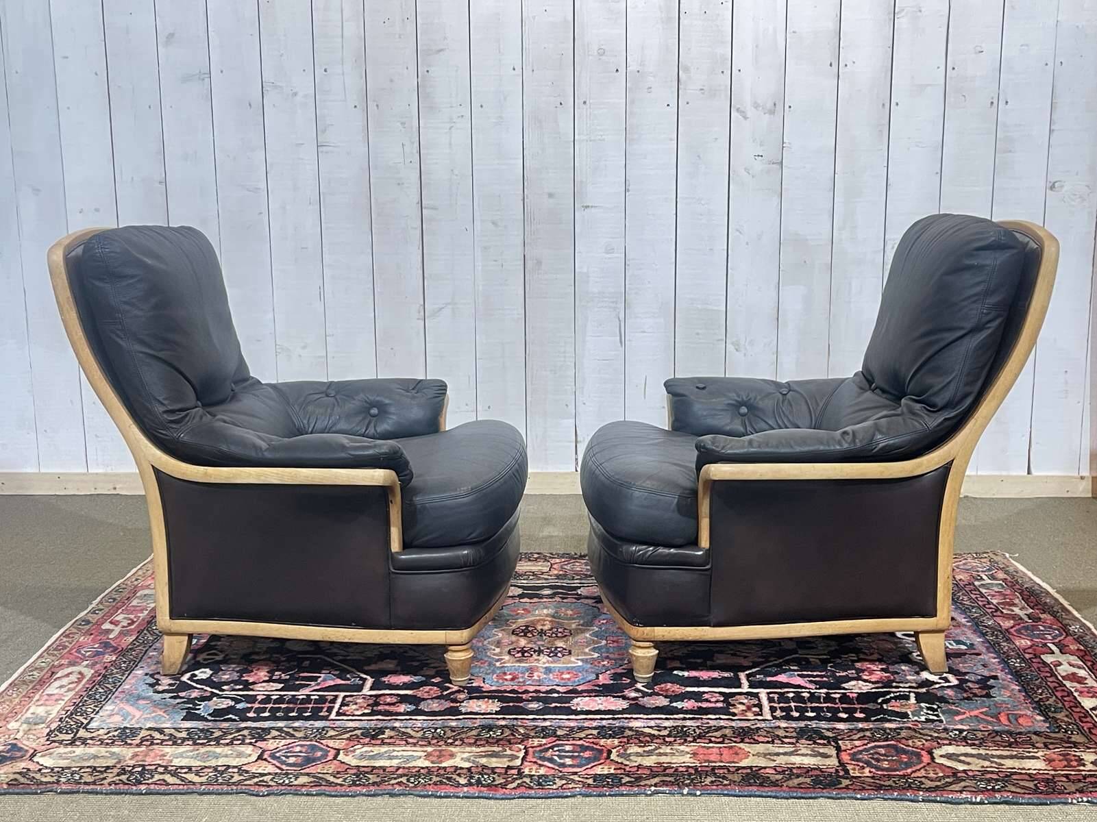 Pair of leather and beech armchairs from the 1970s.