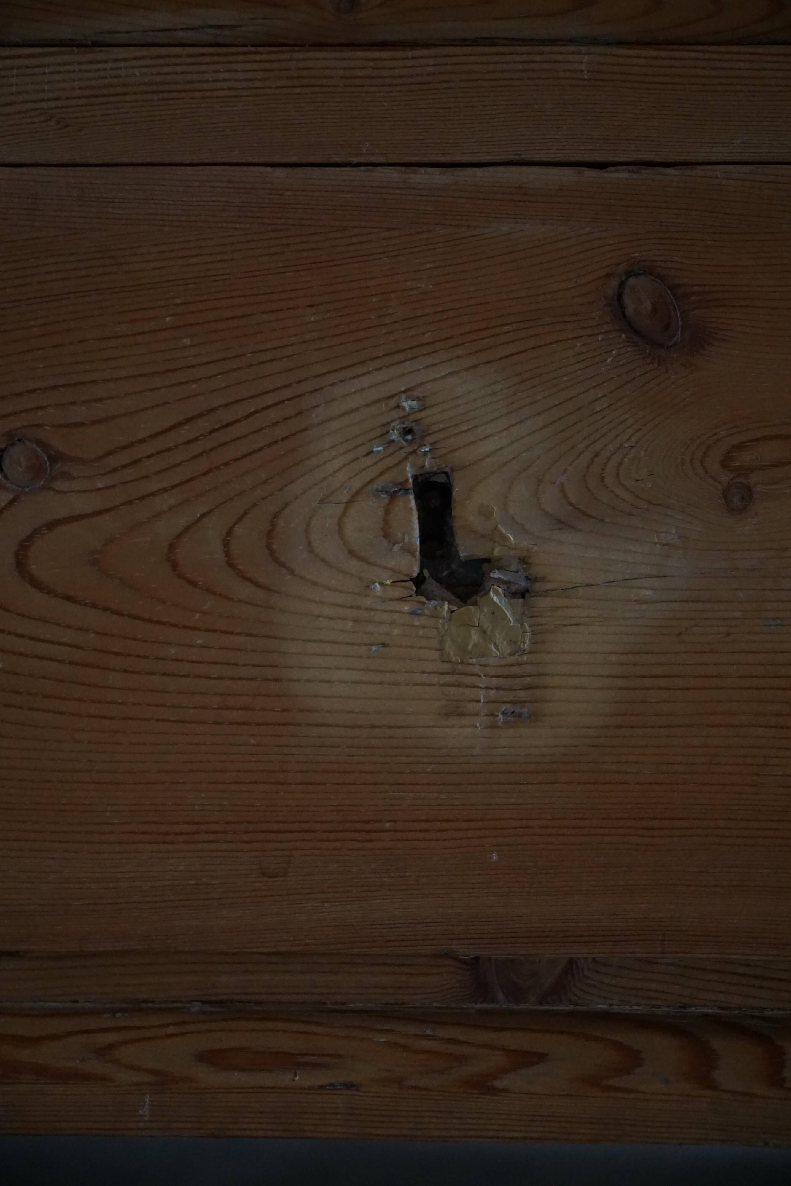Antique Danish pine commode with ball feet, late 19th century.