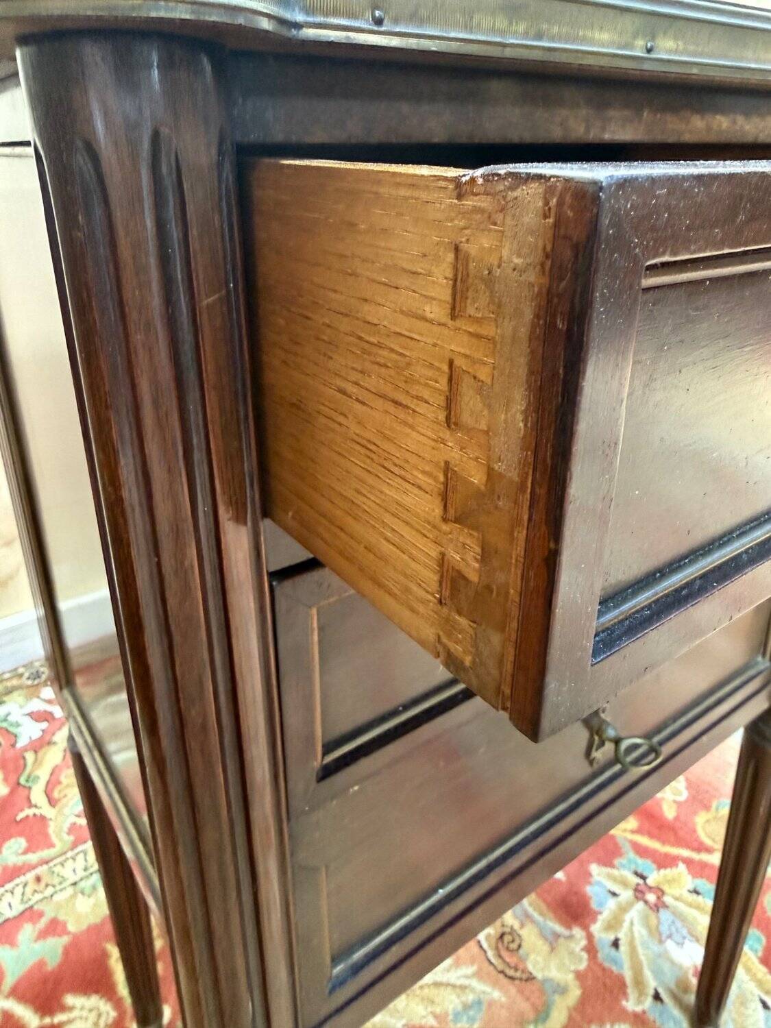 Pair of Louis XVI bedside tables in solid mahogany.