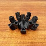 Brutalist cast iron candlestick from mid-century Japan by Jens H. Quistgaard, 1960s.