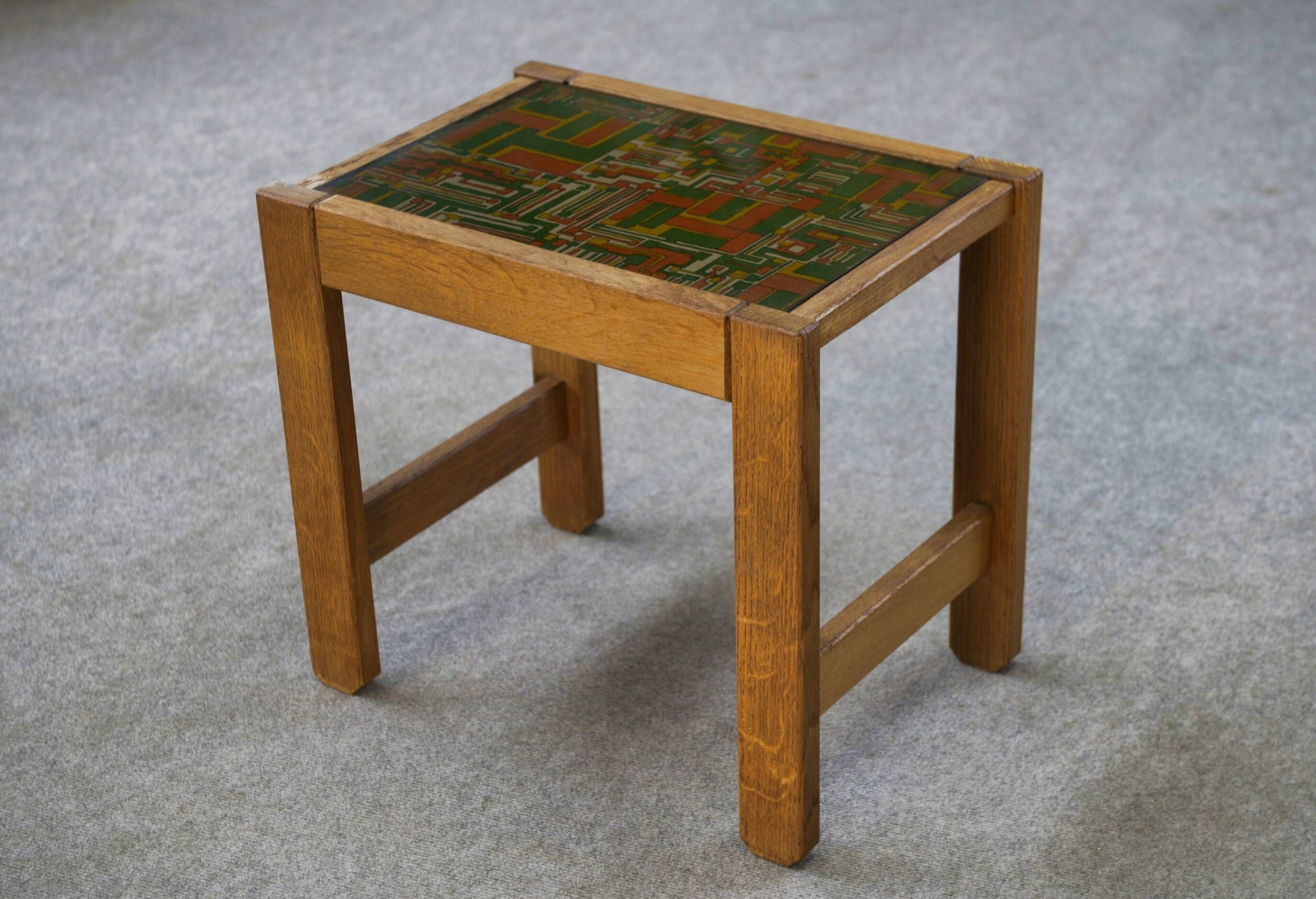 Occasional table in solid oak with a fabric top in the style of Guillerme and Chambron from the 1960s.