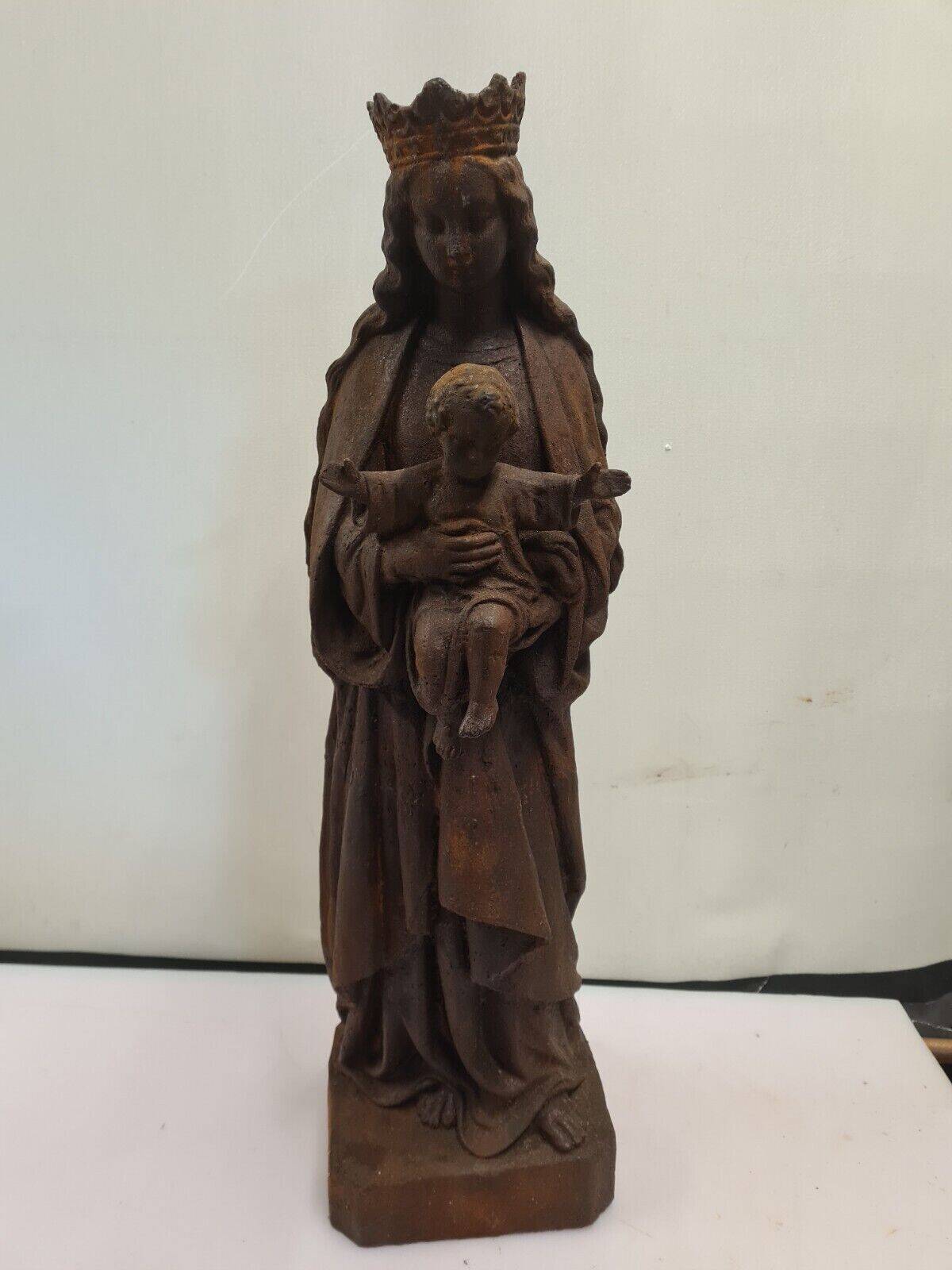 statue of the holy virgin in cast iron
