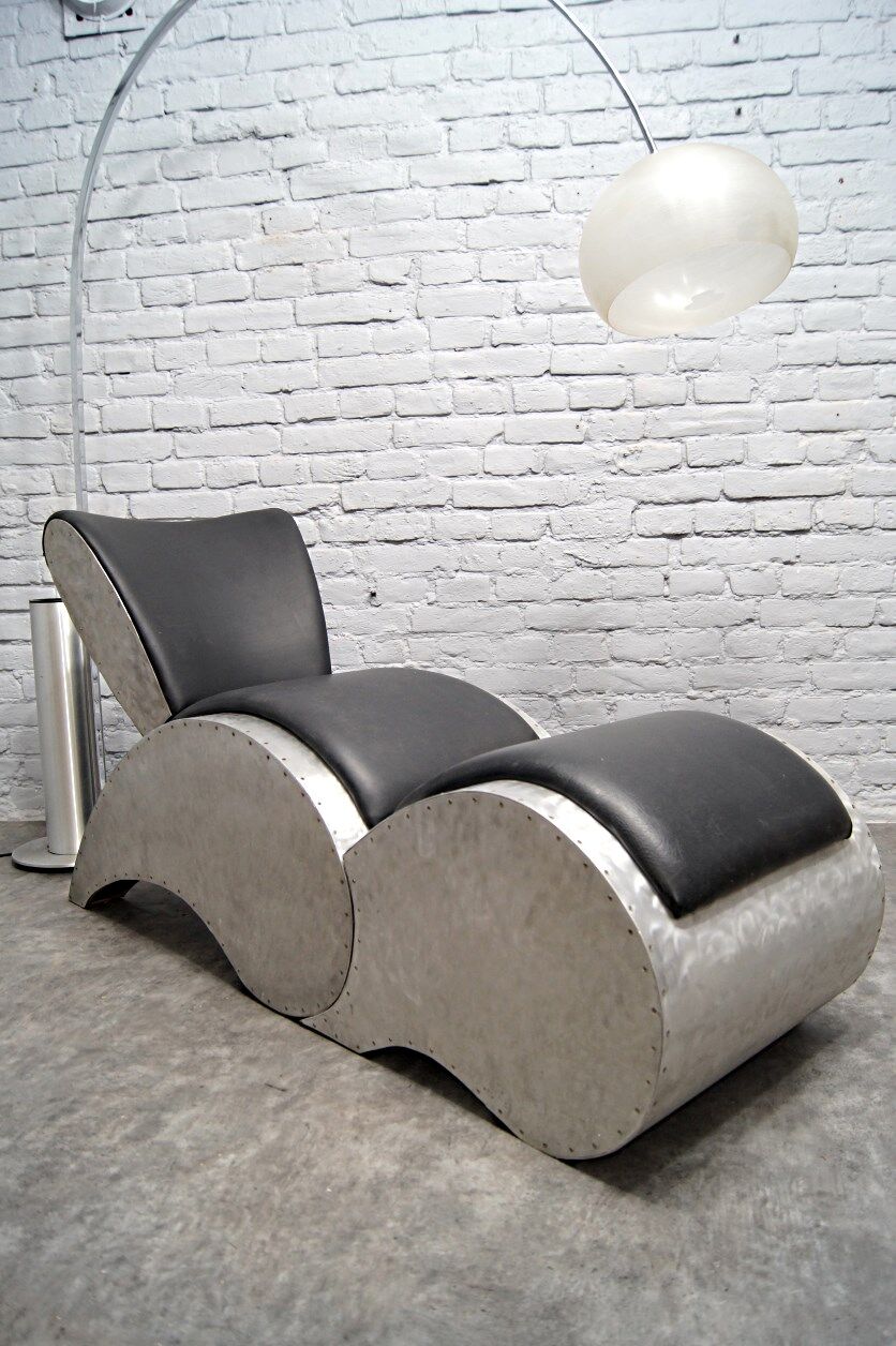 Industrial aluminum & vinyl lounge chair with footrest, 1970s