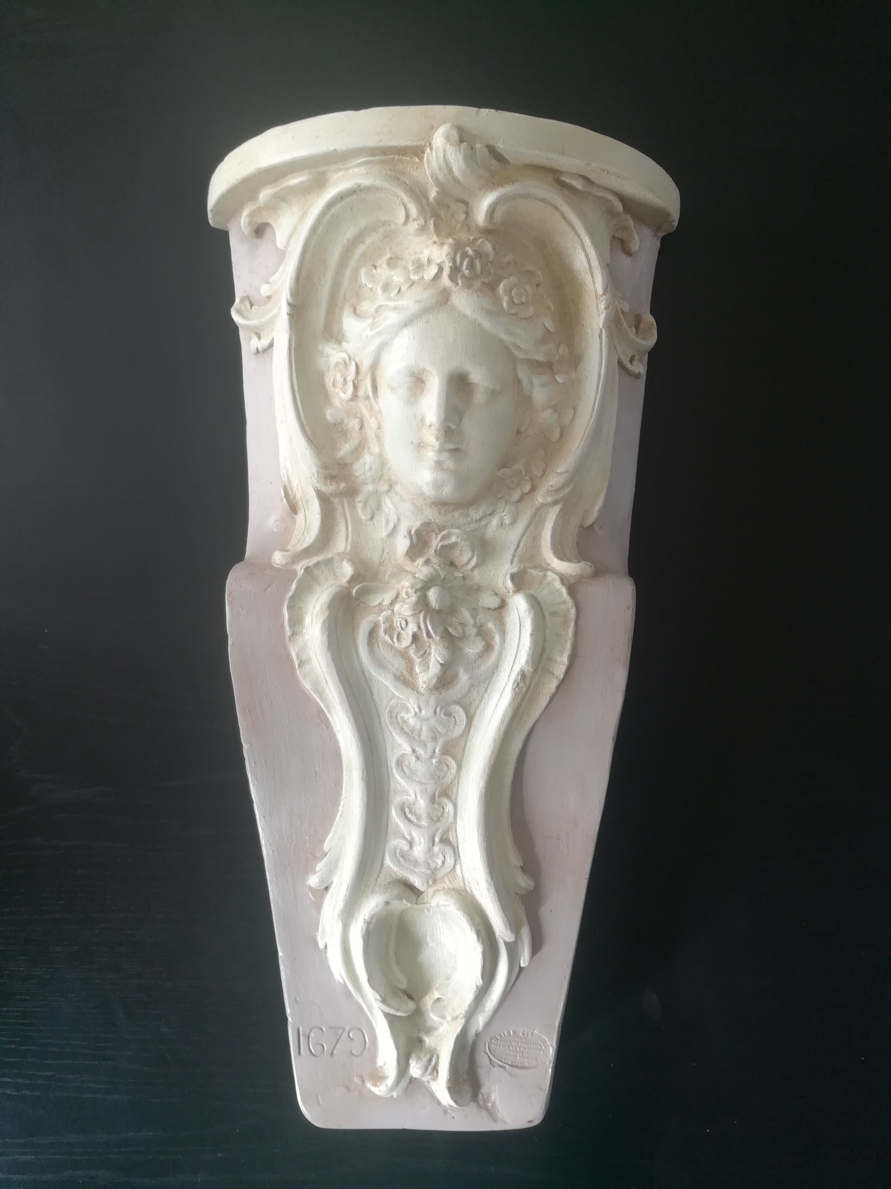 Patinated plaster wall cariatide console