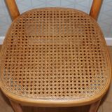 Light beech chair with caned seat