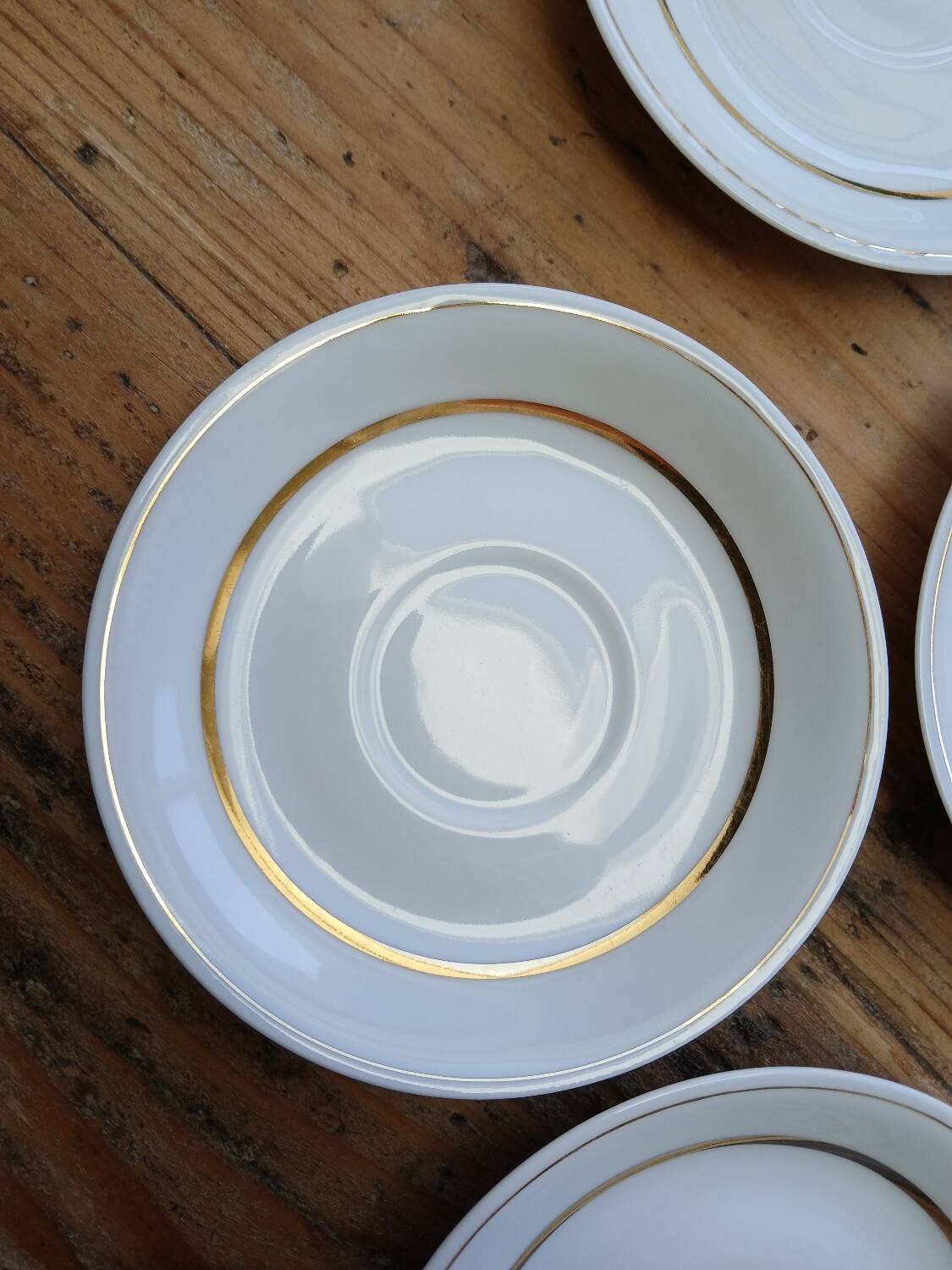 Set of 7 Limoges porcelain cups and saucers