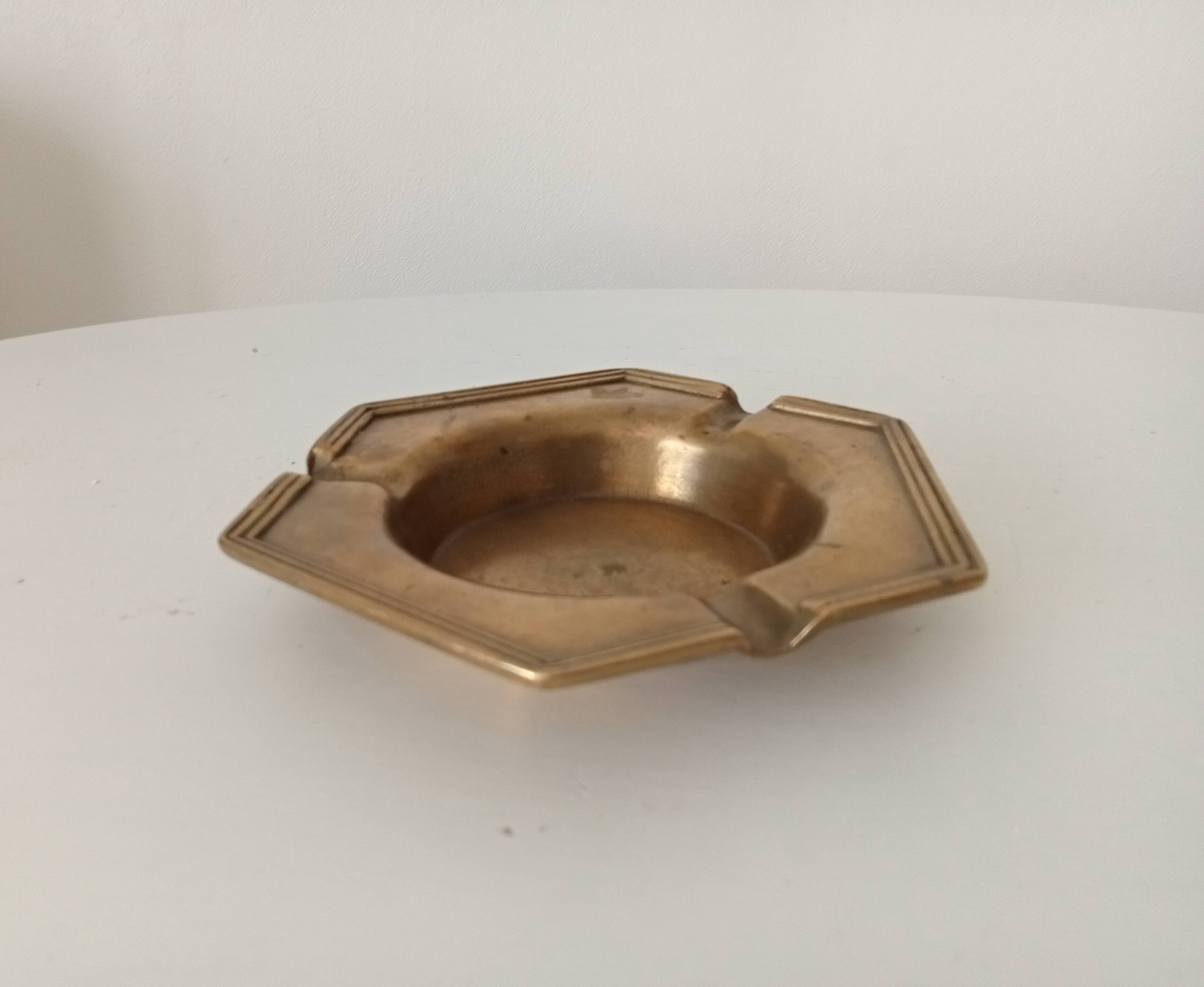Antique ashtray in solid gilded brass