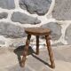 Tripod stool in turned wood